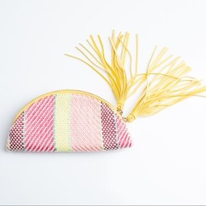 Woven circle fold-over clutch